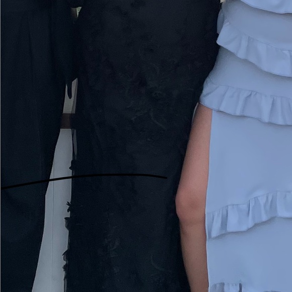 Stunning and slimming!! This Aiden Maddox dress is from Bloomingdales q
10/24 - Picture 4 of 4